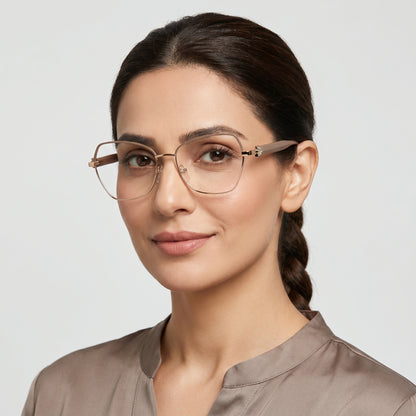 Woman wearing glasses with a plain background