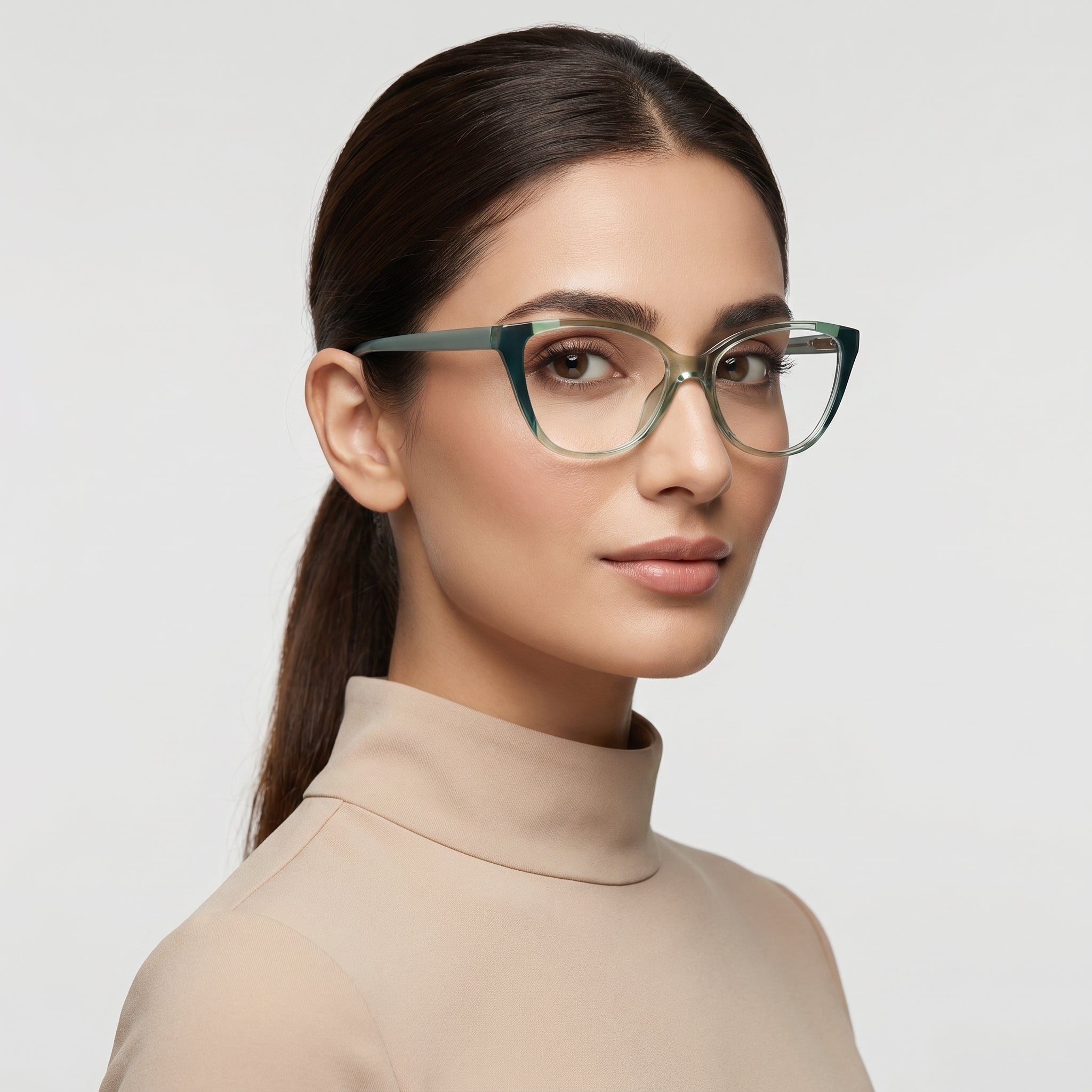 Woman wearing eyeglasses with a plain background